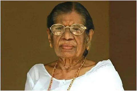 Kerala Communist Leader KR Gouri Amma, who died on May 11, in a white dress looking to camera