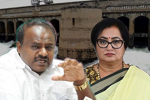 HD Kumaraswamy and Sumalatha with dam in background