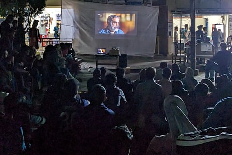 Students watching the banned BBC documentary