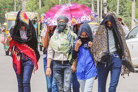 A group of friends walking in the sun