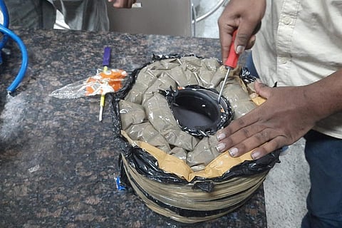 Heroin packets seized at Hyderabad airport concealed in a pipeline that was part of check-in baggage