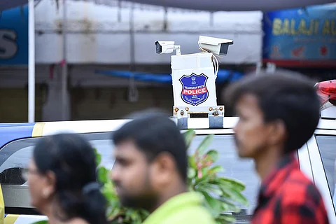 Two CCTV cameras mounted on top of a Telangana police car