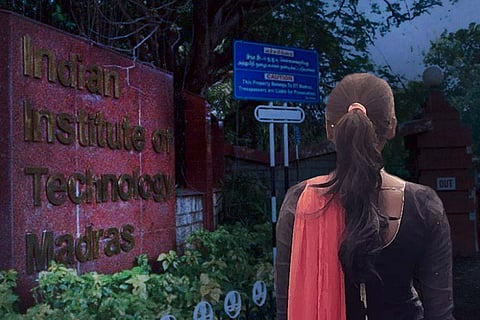 Silhoutte of a woman against the backdrop of IIT-Madras