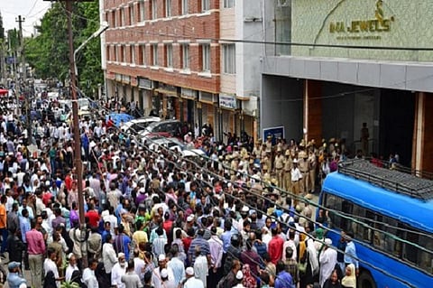 Protestors against IMA scam