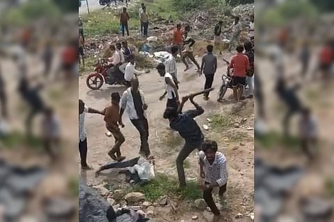 Screenshot from the video where one person is being attacked brutally