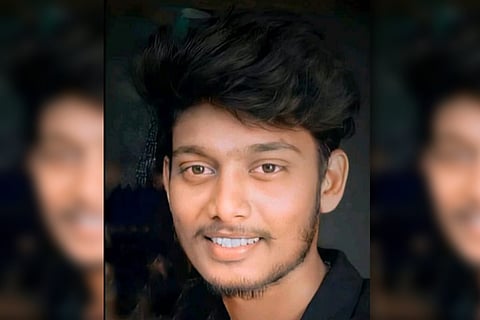 Close up shot of man in black shirt