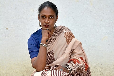 Woman posing in saree from India Handmade Collective