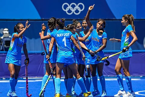 India's Vandana Katariya celebrates with teammates after scoring a goal against Britain during their women's field hockey bronze medal match, at the 2020 Summer Olympics, in Tokyo.