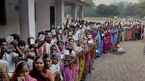 Representative image of people waiting to cast their vote