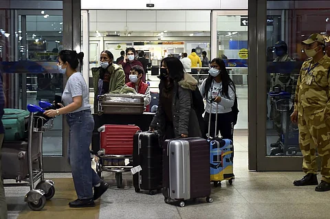 Indians walking out of the Indira Gandhi International Airport after returning from Ukraine