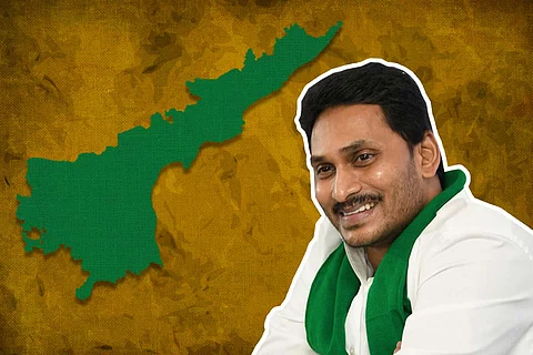 Andhra Pradesh Chief Minister against a backdrop of the state map