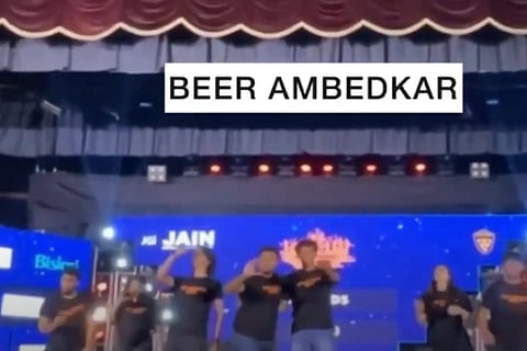 Screenshot from the video snippet of the skit, showing performers on stage