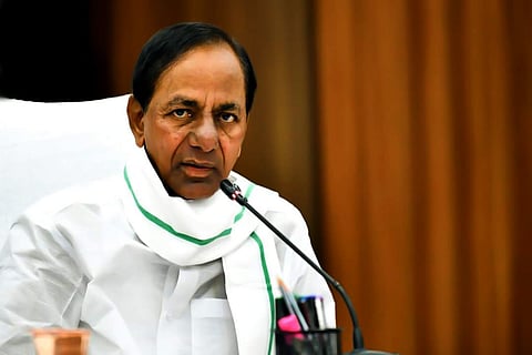 Telangana CM KCR in a white shirt