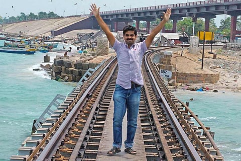 KM Basheer at a railway track