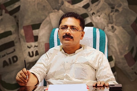 Kerala Minister KT Jaleel sitting in an arm chair