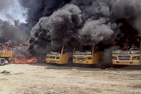 Buses on fire at the Sakthi Matriculation School protest
