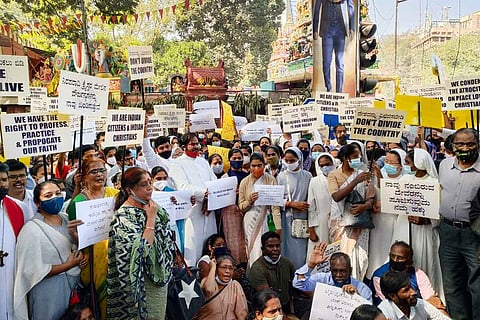 anti-conversion bill protesters holding placards in Bengaluru