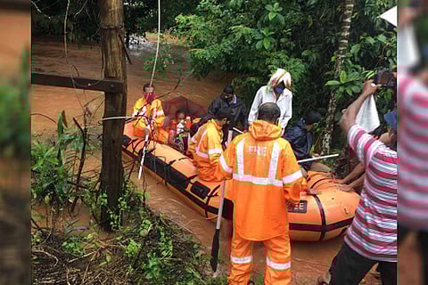 Residents from flooded houses in Kasaragod being rescued