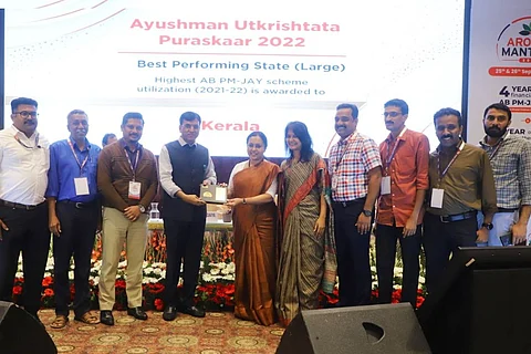 Kerala Health Minister receiving the award