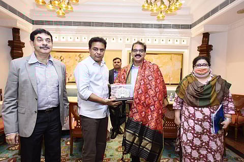 Telangana Industries Minister KTR felicitating Kitex MD Sabu Jacob with a shawl