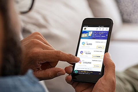 KreditBee app on phone