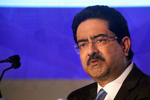 Kumar Mangalam Birla dressed in suit