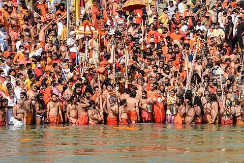 The large crowd gathered at the Kumbh Mela to take a dip in the Ganga