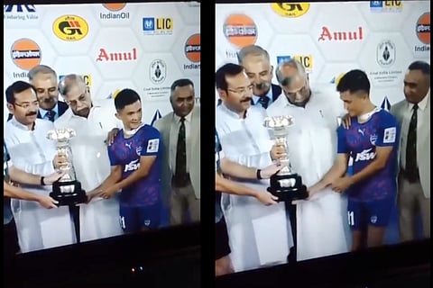 Screengrab from video showing West Bengal governor, La Ganesan, slightly pushing Sunil Chhetri