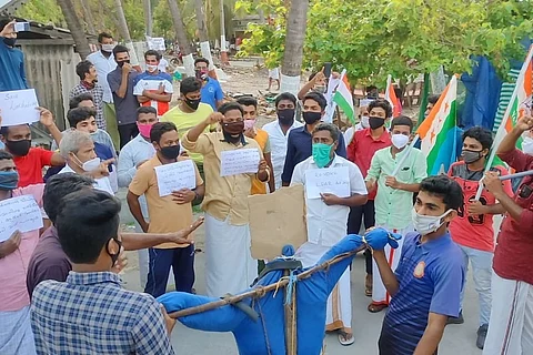 A group of residents of the Kiltan island in Lakshadweep protest the new administrative reforms in the Union Territory