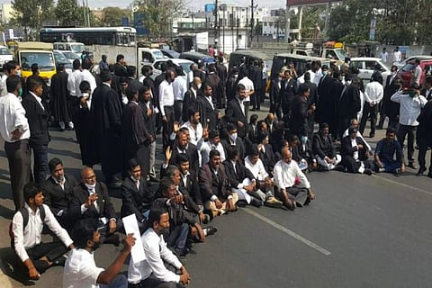 Lawyers blocking a road in Hyderabad in protest against the murder of Telangana lawyer couple