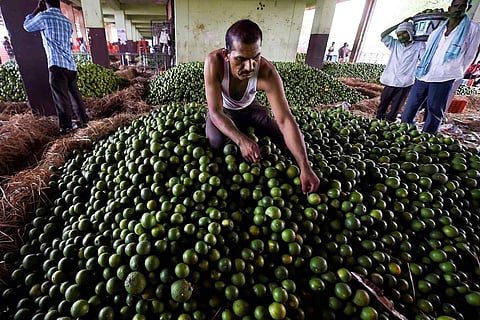 A worker at a market in India