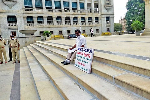 MLA Kumaraswamy sitting alone at Vidhana Soudha