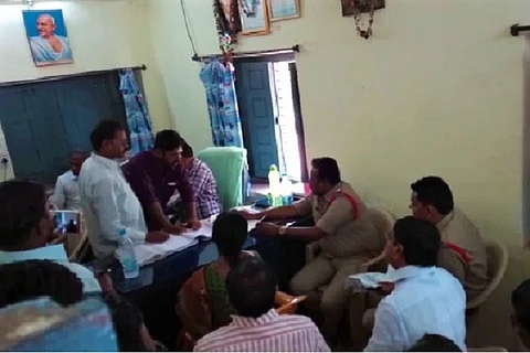 Telangana farmer tries to set MRO office staff on fire, taken into police custody