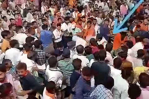 BJP workers assaulting MRPS protesters at PM Modi's public meeting in Hyderabad