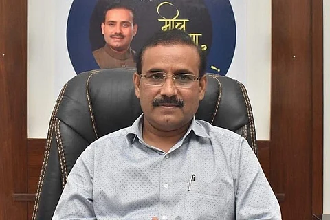 A file image of Maharashtra Health Minister Rajesh Tope sitting on a leather chair wearing a grey shirt and looking into camera
