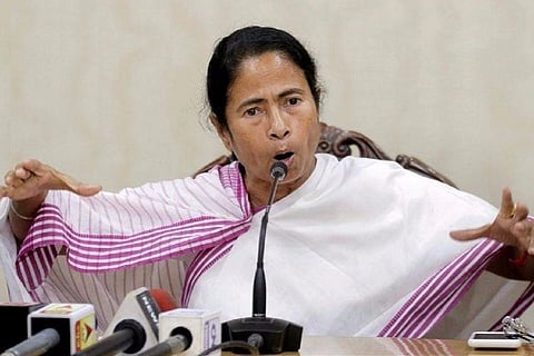 Mamata Banerjee addressing reporters