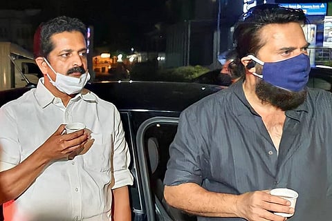 Mammootty and another man have tea