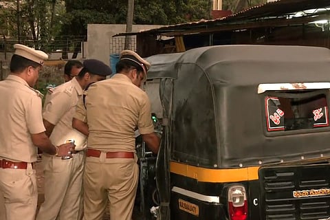Police investigate the Mangaluru auto blast