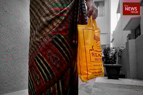 Representational image of a woman carrying a manjappai