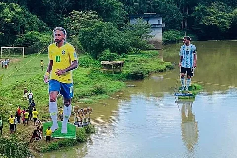 Cut out of footballers Neymar and Messi