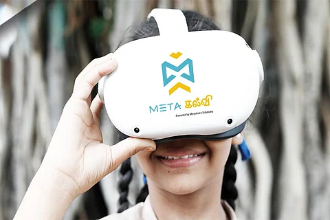 A student from Lady Willingdon Higher Secondary School, wearing Meta Kalvi VR headset.