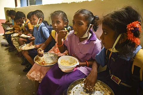 Representative image of students having mid-day meal