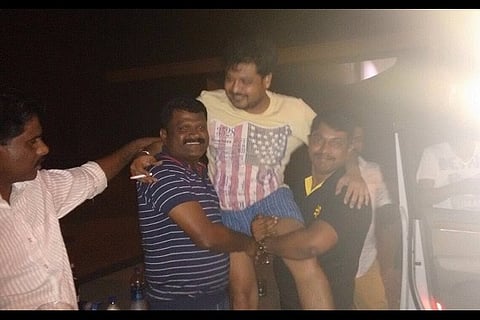 Image of Karnataka minister’s son being lifted by cops goes viral on social media