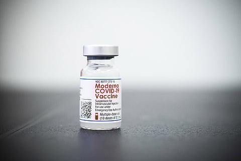 A bottle with a Moderna COVID19 vaccine label