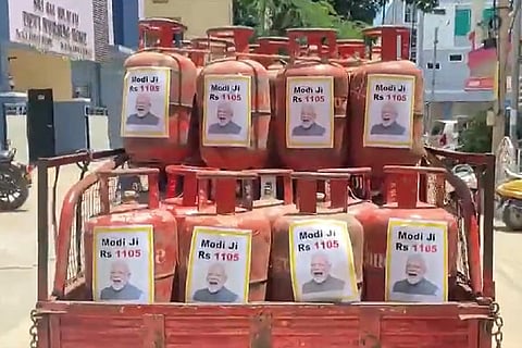 LPG Cylinders with PM Modi's image stuck to it