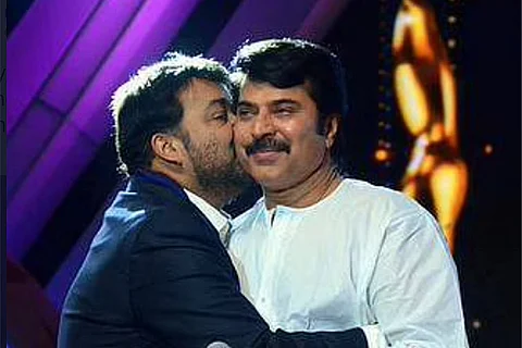 Mollywood actor Mohanlal hugging actor Mammootty