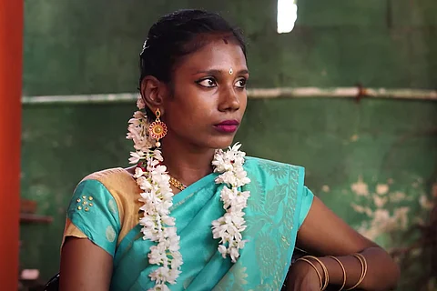 Mrs Go in a blue saree
