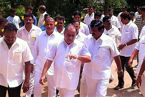 Denied permission for Amaravati padayatra, Kapu leaders protest with flowers in their ears