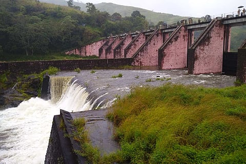 Water flowing out of the sluice gates of Mullaperiyar dam