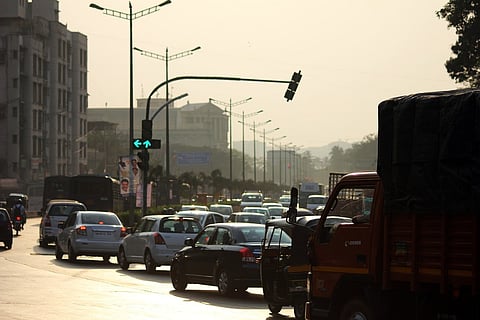 Four wheeler traffic on a road in Mumbai